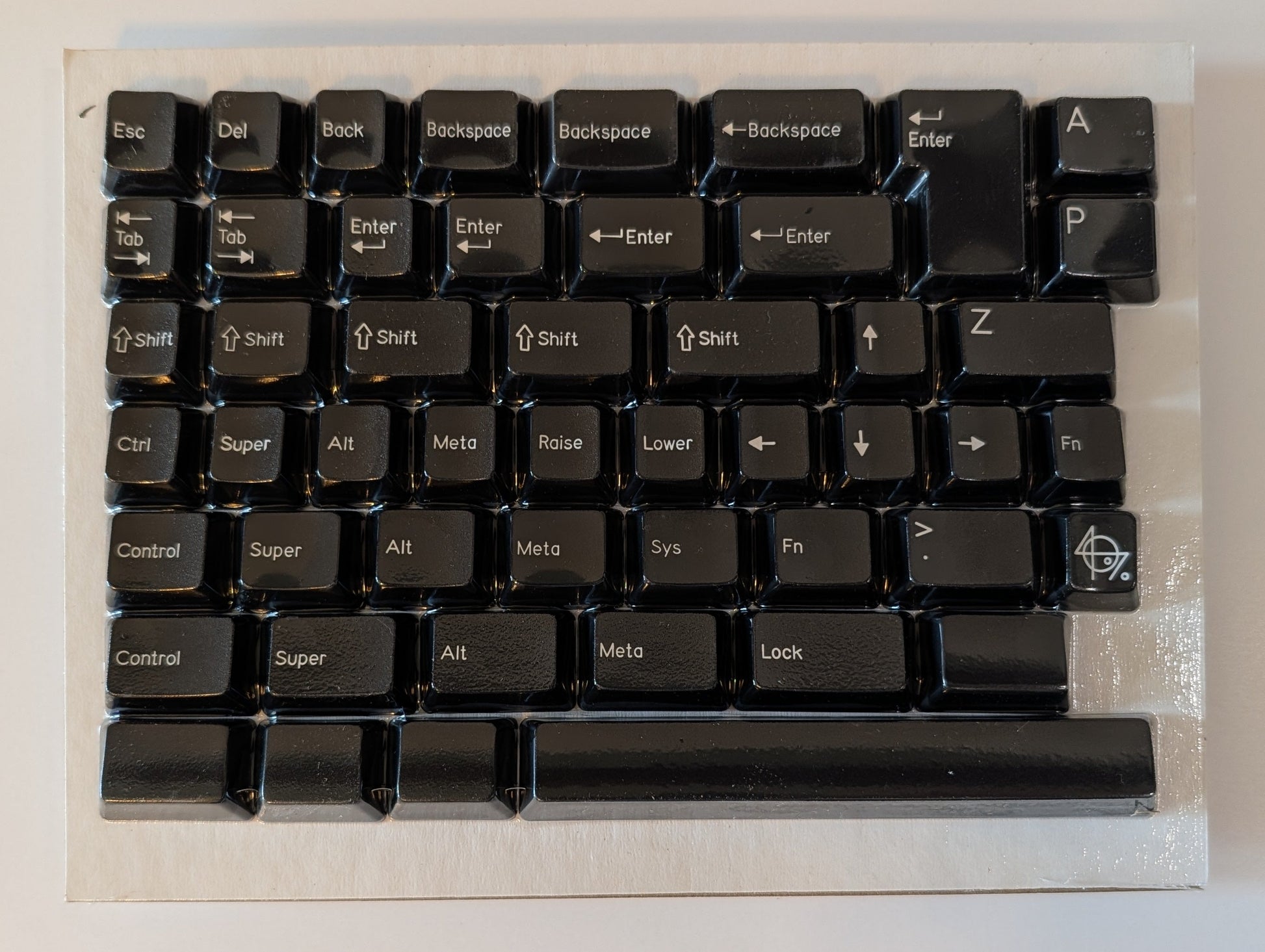 Black keyboard keycaps on a white background