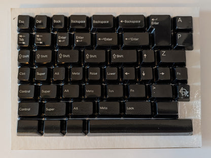 Black keyboard keycaps on a white background